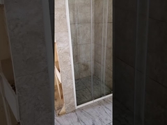 three door shower screen with white profile and knob handle